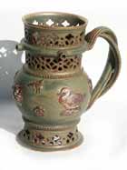 green and gold puzzle jug